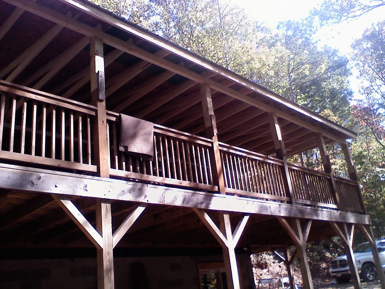 Timber framing under a new elevated porch and deck — Roof Leak Repair in Van Meter by Roofing Brothers